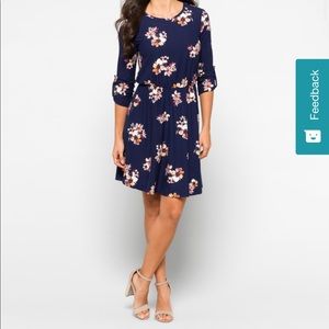 Floral dress. New with tags. Size small. Never worn